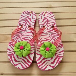 Pink Zebra Flip Flops with Green Flower